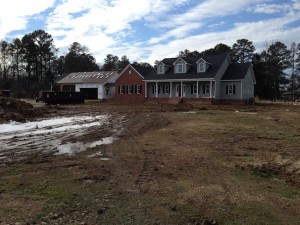 The mound is dirt along the driveway is partially gone!