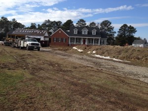 The pile of dirt blocking the front of the house is gone!