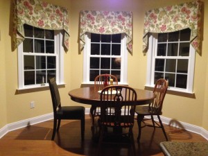 Remember all those pictures we took of an empty breakfast nook, well look, now in it are a table and chairs!