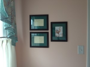 Finally hung pictures in the master bathroom - including a favorite picture of Trevor and me.