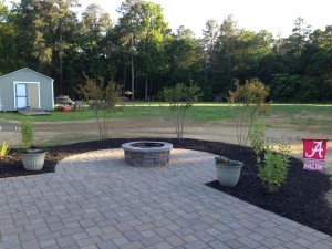 Fire pit.  Anxious to learn the color of the Crepe Myrtles.